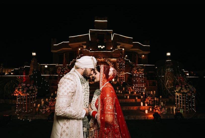 omantic wedding couple portrait in golden hour natural light