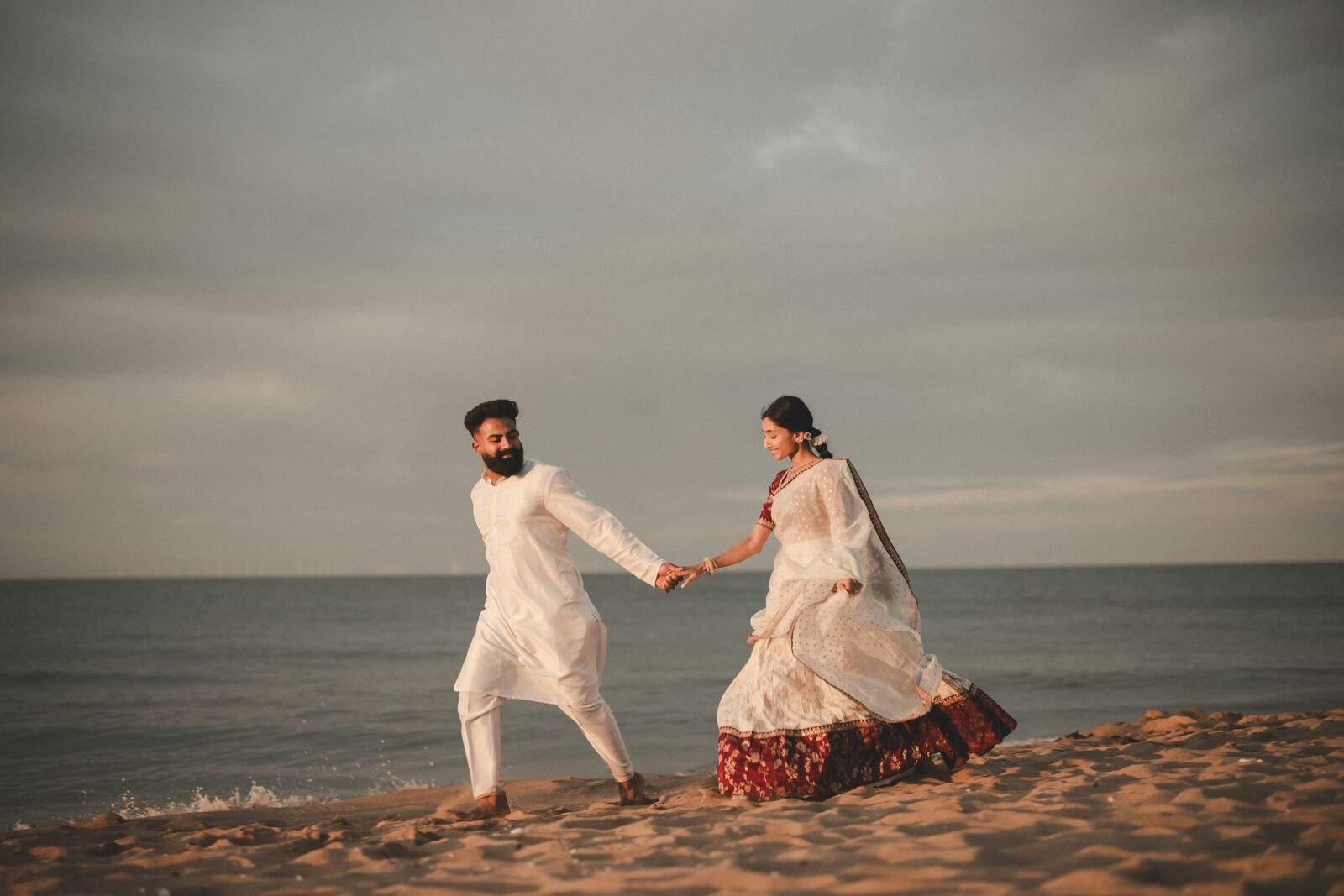 Couple walking on beach