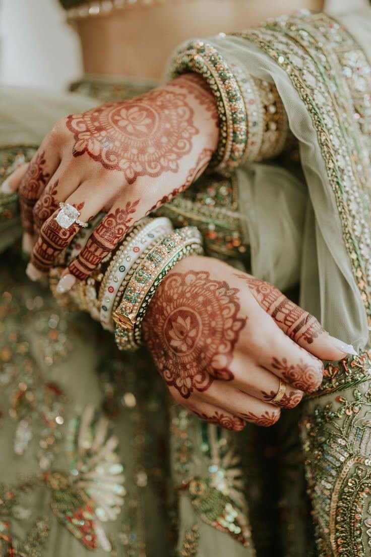 Mehndi hands with rings